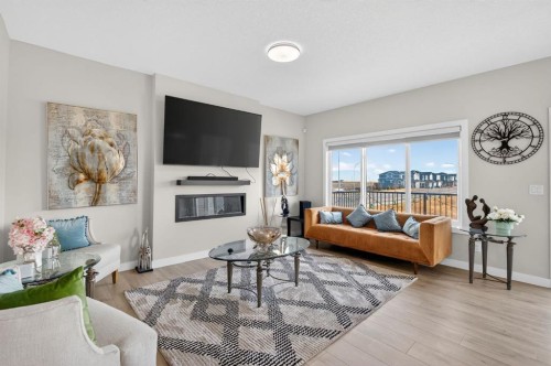 12 Cornerbrook Cove Ne, Calgary, AB - Indoor Photo Showing Living Room With Fireplace