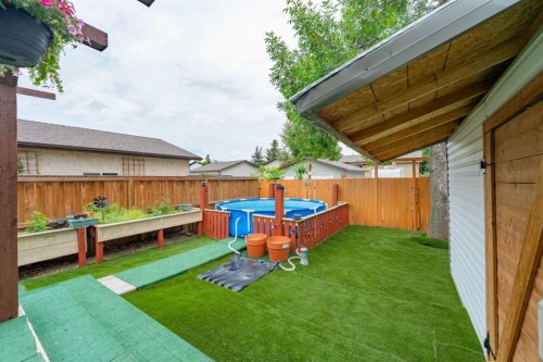80 Taylor Way Se, Airdrie, AB - Outdoor With Backyard
