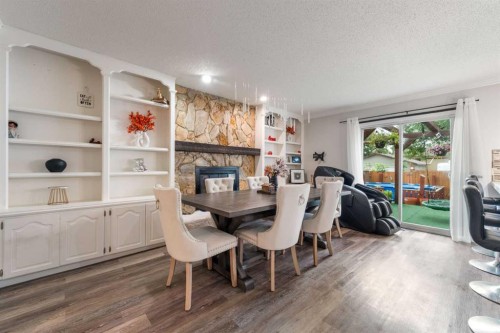 80 Taylor Way Se, Airdrie, AB - Indoor With Fireplace