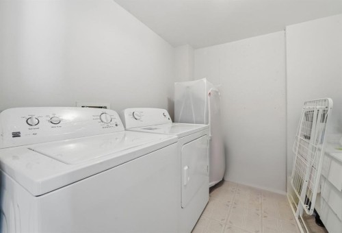 49 Royal Birch Mount Nw, Calgary, AB - Indoor Photo Showing Laundry Room