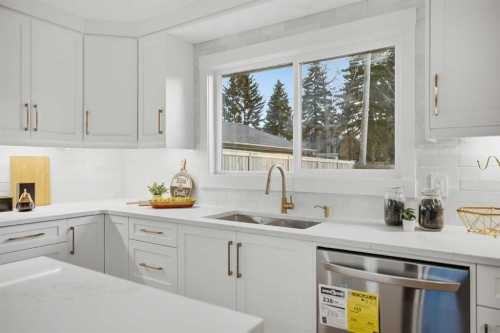 9407 Allison Drive Se, Calgary, AB - Indoor Photo Showing Kitchen With Upgraded Kitchen