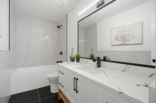9407 Allison Drive Se, Calgary, AB - Indoor Photo Showing Bathroom