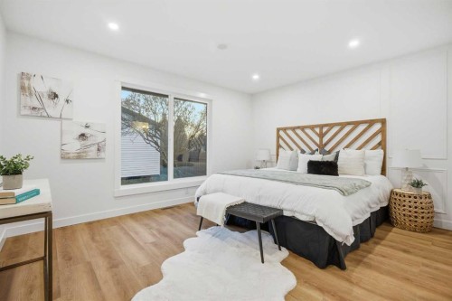 9407 Allison Drive Se, Calgary, AB - Indoor Photo Showing Bedroom