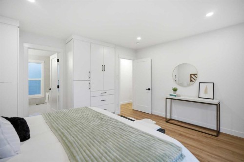 9407 Allison Drive Se, Calgary, AB - Indoor Photo Showing Bedroom