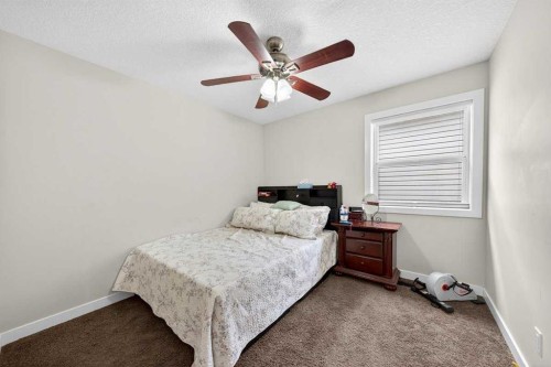 64 Panton Link Nw, Calgary, AB - Indoor Photo Showing Bedroom