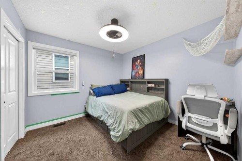 64 Panton Link Nw, Calgary, AB - Indoor Photo Showing Bedroom