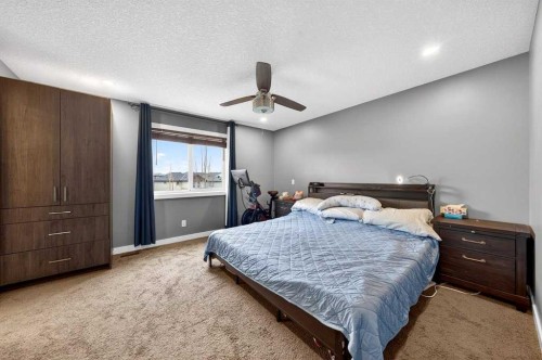 64 Panton Link Nw, Calgary, AB - Indoor Photo Showing Bedroom