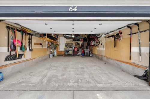64 Panton Link Nw, Calgary, AB - Indoor Photo Showing Garage
