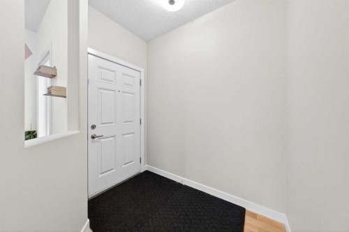 64 Panton Link Nw, Calgary, AB - Indoor Photo Showing Other Room