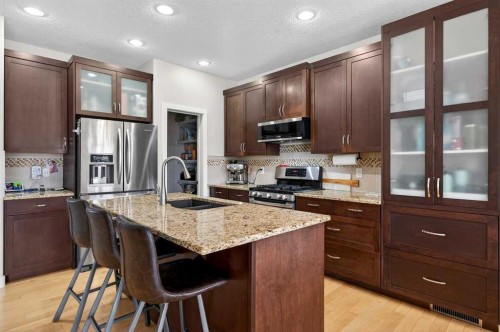 64 Panton Link Nw, Calgary, AB - Indoor Photo Showing Kitchen With Double Sink With Upgraded Kitchen