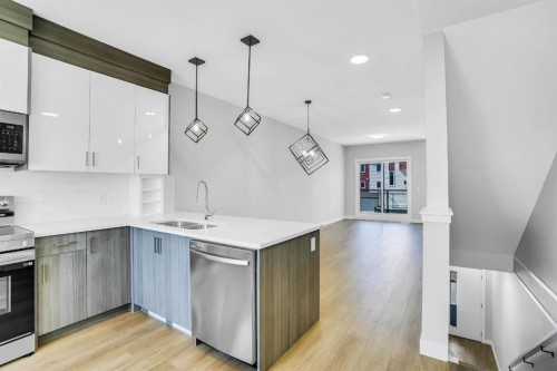 304 Red Sky Villas Ne, Calgary, AB - Indoor Photo Showing Kitchen With Double Sink With Upgraded Kitchen