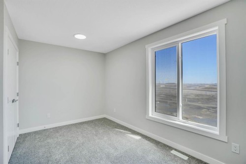 304 Red Sky Villas Ne, Calgary, AB - Indoor Photo Showing Other Room