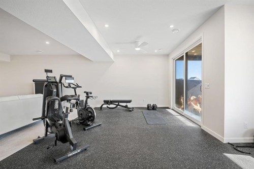 66 Savoy Landing Se, Calgary, AB - Indoor Photo Showing Gym Room