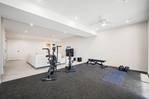 66 Savoy Landing Se, Calgary, AB - Indoor Photo Showing Gym Room