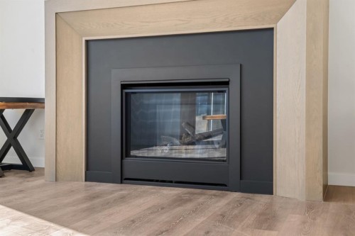 66 Savoy Landing Se, Calgary, AB - Indoor With Fireplace