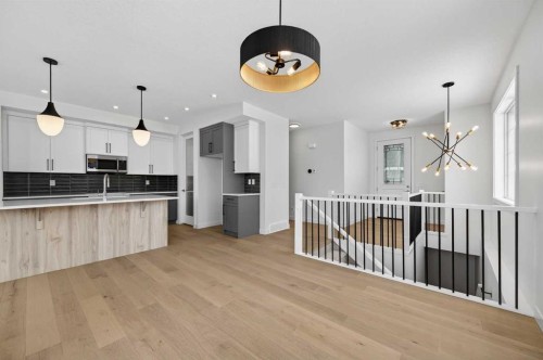 277 Waterford Way, Chestermere, AB - Indoor Photo Showing Kitchen With Upgraded Kitchen
