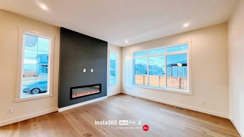 277 Waterford Way, Chestermere, AB - Indoor With Fireplace
