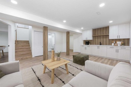 307 Hamptons Mews Nw, Calgary, AB - Indoor Photo Showing Living Room