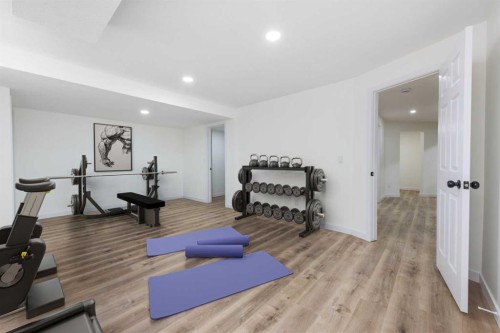 307 Hamptons Mews Nw, Calgary, AB - Indoor Photo Showing Gym Room