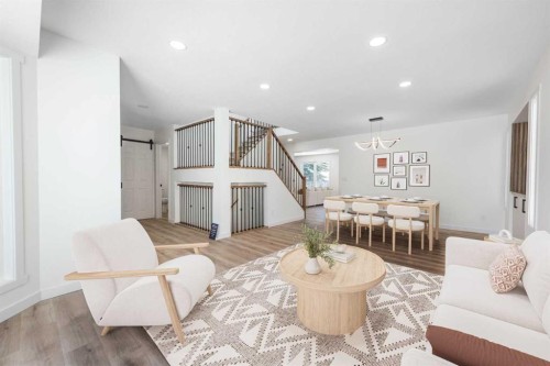 307 Hamptons Mews Nw, Calgary, AB - Indoor Photo Showing Living Room