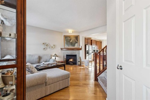 15008 Prestwick Boulevard Se, Calgary, AB - Indoor Photo Showing Living Room With Fireplace