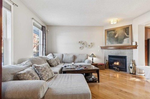 15008 Prestwick Boulevard Se, Calgary, AB - Indoor Photo Showing Living Room With Fireplace