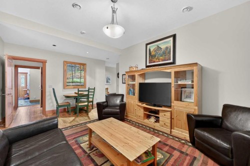 997 Wilson Way, Canmore, AB - Indoor Photo Showing Living Room