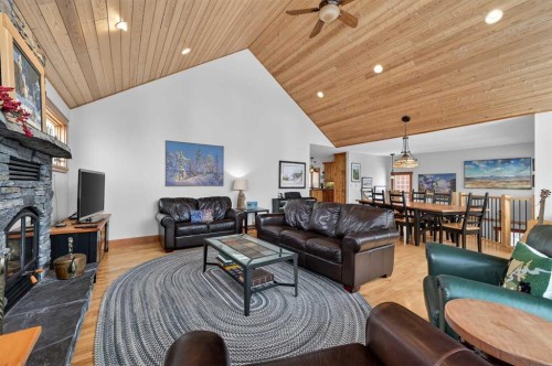 997 Wilson Way, Canmore, AB - Indoor Photo Showing Living Room With Fireplace