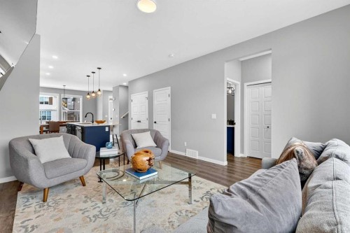 94 Wolf Gate Nw, Okotoks, AB - Indoor Photo Showing Living Room