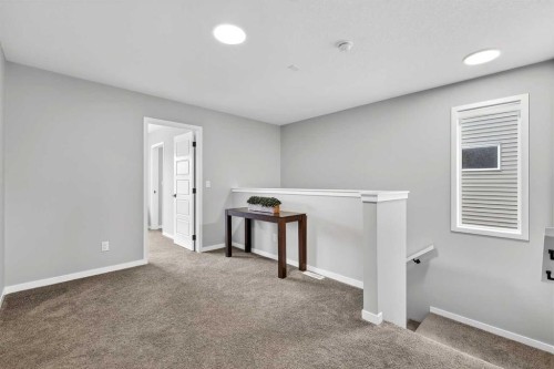 94 Wolf Gate Nw, Okotoks, AB - Indoor Photo Showing Other Room