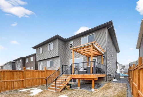 94 Wolf Gate Nw, Okotoks, AB - Outdoor With Deck Patio Veranda