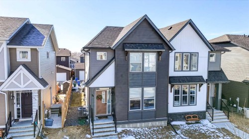 94 Wolf Gate Nw, Okotoks, AB - Outdoor With Facade