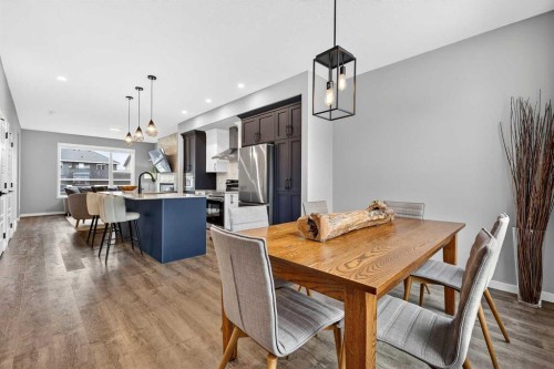 94 Wolf Gate Nw, Okotoks, AB - Indoor Photo Showing Dining Room