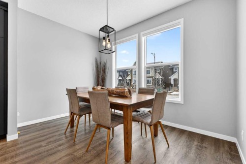 94 Wolf Gate Nw, Okotoks, AB - Indoor Photo Showing Dining Room