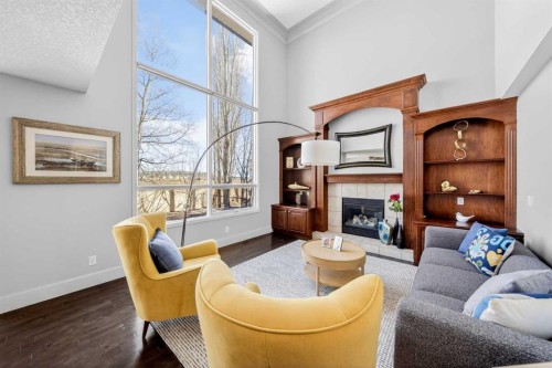46 Discovery Ridge Road Sw, Calgary, AB - Indoor Photo Showing Living Room With Fireplace