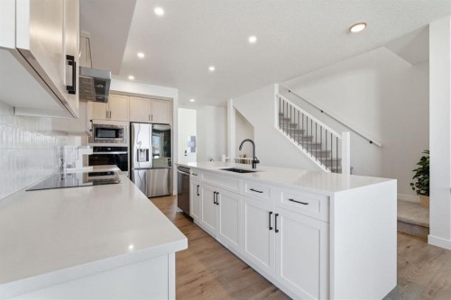 459 Rivercrest Road, Cochrane, AB - Indoor Photo Showing Kitchen With Upgraded Kitchen