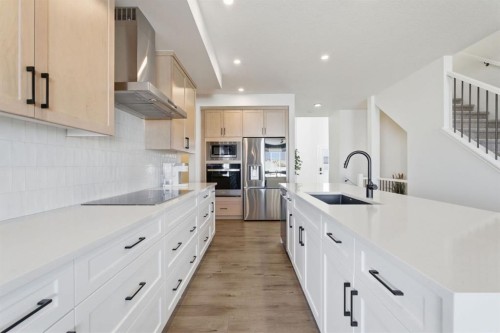 459 Rivercrest Road, Cochrane, AB - Indoor Photo Showing Kitchen With Upgraded Kitchen