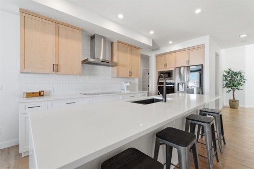 459 Rivercrest Road, Cochrane, AB - Indoor Photo Showing Kitchen With Upgraded Kitchen