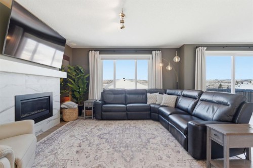 459 Rivercrest Road, Cochrane, AB - Indoor Photo Showing Living Room With Fireplace