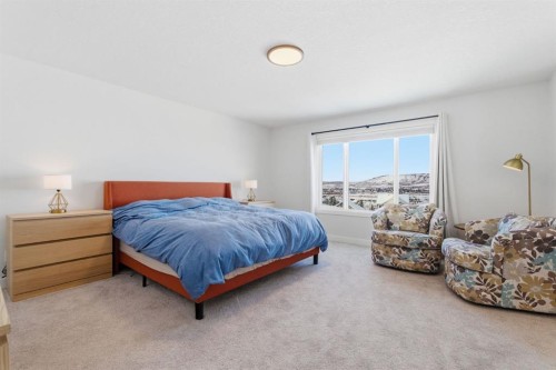 459 Rivercrest Road, Cochrane, AB - Indoor Photo Showing Bedroom