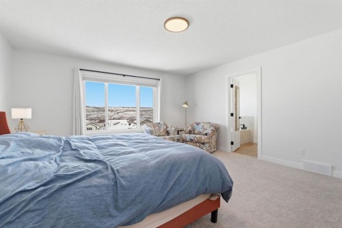 459 Rivercrest Road, Cochrane, AB - Indoor Photo Showing Bedroom