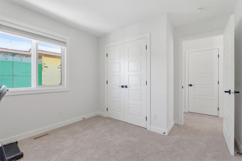 459 Rivercrest Road, Cochrane, AB - Indoor Photo Showing Other Room