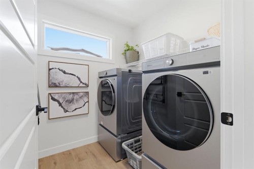 459 Rivercrest Road, Cochrane, AB - Indoor Photo Showing Laundry Room