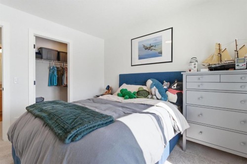 459 Rivercrest Road, Cochrane, AB - Indoor Photo Showing Bedroom