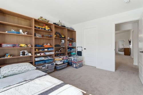 459 Rivercrest Road, Cochrane, AB - Indoor Photo Showing Bedroom