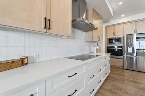 459 Rivercrest Road, Cochrane, AB - Indoor Photo Showing Kitchen With Upgraded Kitchen