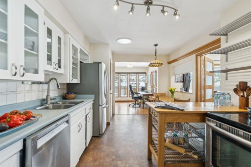 2363 23 Street Nw, Calgary, AB - Indoor Photo Showing Kitchen With Double Sink
