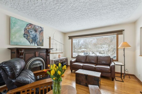 2363 23 Street Nw, Calgary, AB - Indoor Photo Showing Living Room With Fireplace
