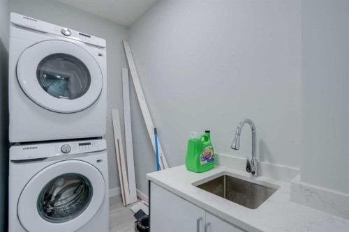 673 Corner Meadows Way Ne, Calgary, AB - Indoor Photo Showing Laundry Room