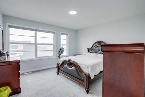 673 Corner Meadows Way Ne, Calgary, AB - Indoor Photo Showing Bedroom